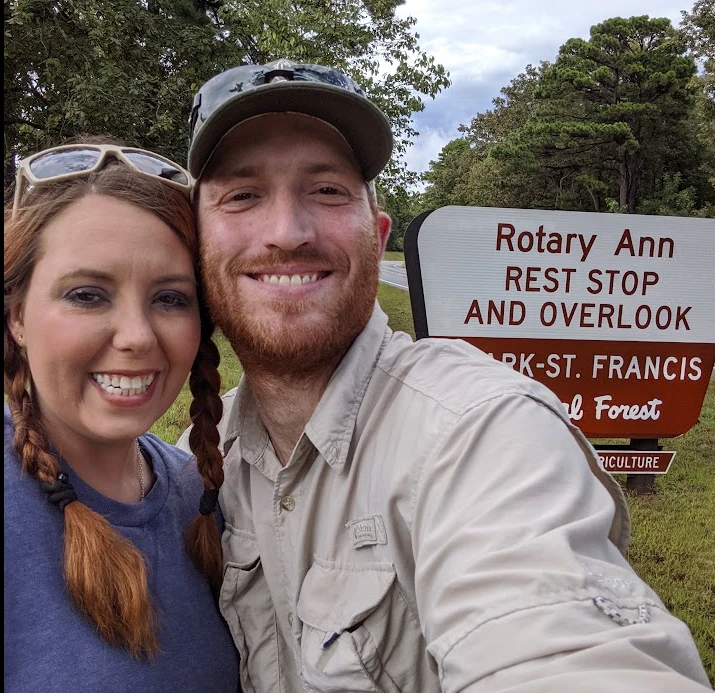 Mike Whobrey and his wife smiling for a selfie at a national forest overlook